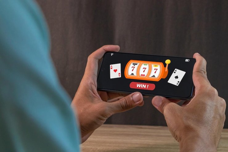 Pengguna sports betting menggunakan ponsel pintar dengan layar aplikasi bertema elegan